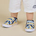 Sneakers a righe colorate neonato