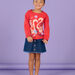 T-shirt con motivi fantasia con glitter e paillettes