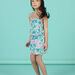Tuta corta con stampa tropicale blu bambina